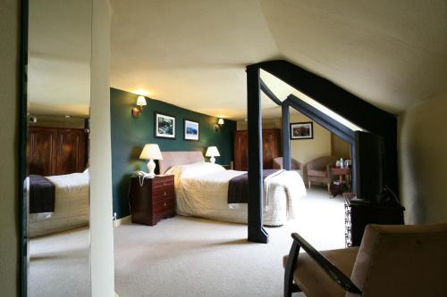 Кровать или кровати в номере The Rock Inn