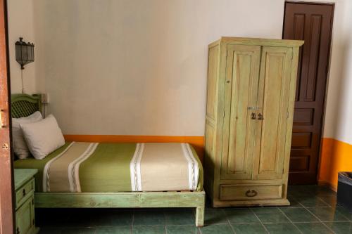 Lova arba lovos apgyvendinimo įstaigoje Casa Vilasanta