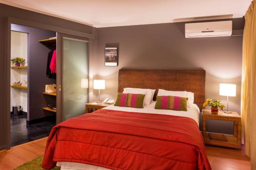 Cama o camas de una habitación en La Sebastiana Suites