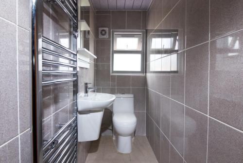 Koupelna v ubytování Budget Rooms