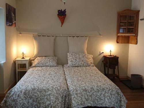 Postel nebo postele na pokoji v ubytování B&B Maison Odille