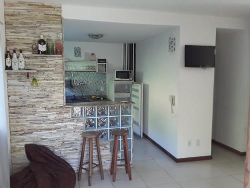 Кухня или кухненски бокс в Resort Villa da praia apto 30 arraial do cabo