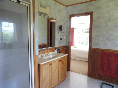 Postel nebo postele na pokoji v ubytování Hideaway Off Heta