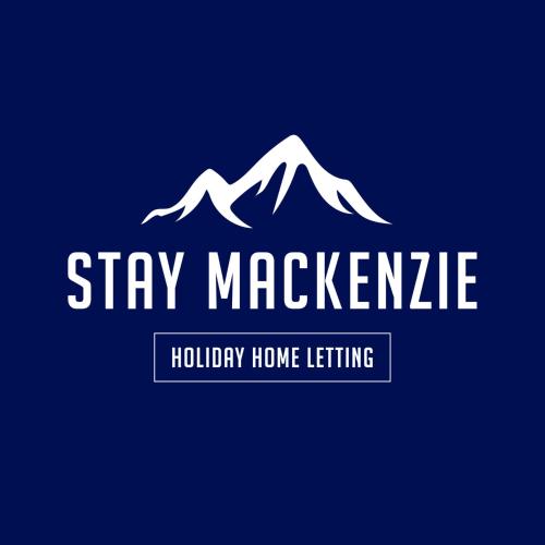 a logo for stay magneticeline holiday home lighting at Hallewell Haven in Twizel