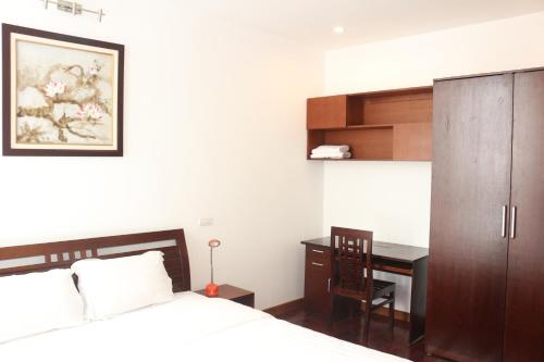 Postel nebo postele na pokoji v ubytování Davidduc's Apartment Xuan Dieu