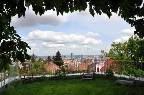a view of the city from the roof of a building at Bratislava Castle Hill Apartment in Bratislava