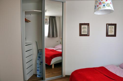Katil atau katil-katil dalam bilik di Bratislava Castle Hill Apartment