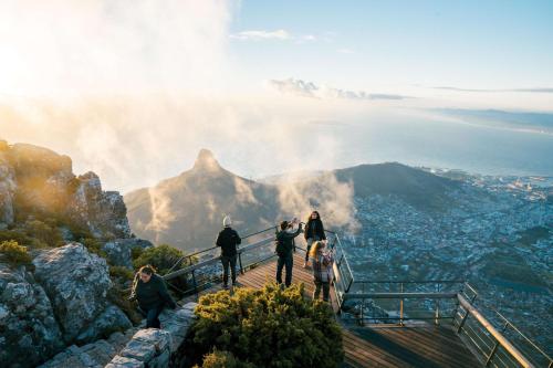 a group of people standing on top of a mountain at Fountains Hotel in Cape Town