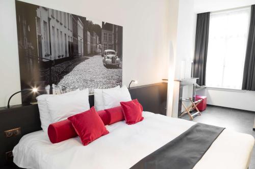 מיטה או מיטות בחדר ב-Zimmerhof Hotel