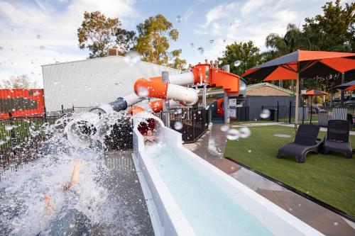 a water slide in a park with a water cannon at NRMA Mildura Riverside Holiday Park in Mildura