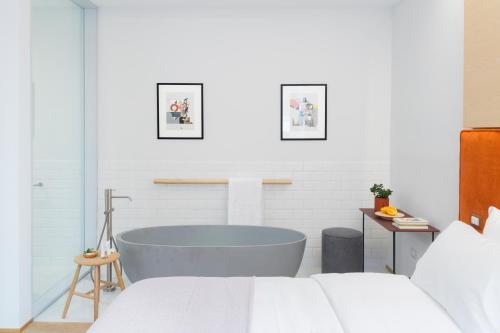 Katil atau katil-katil dalam bilik di The Radical Hotel Roma