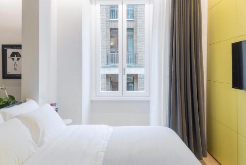 Katil atau katil-katil dalam bilik di The Radical Hotel Roma