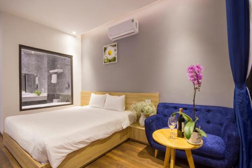 Giường trong phòng chung tại King House Villa Hotel & Spa