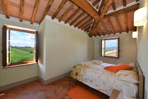 Ένα ή περισσότερα κρεβάτια σε δωμάτιο στο Agriturismo Mocine