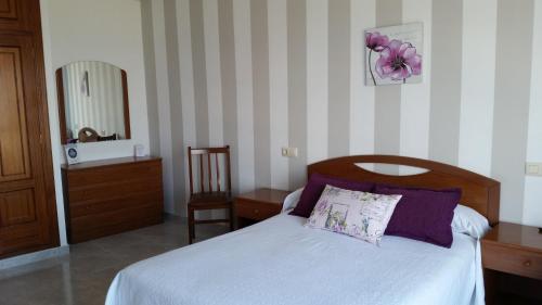 Posteľ alebo postele v izbe v ubytovaní Apartamentos Timón Puerto