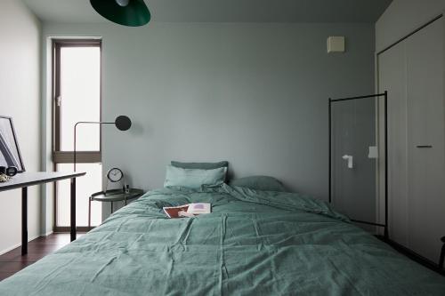 Postel nebo postele na pokoji v ubytování P O IN T - 3BR Villa - Ikebukuro