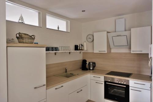 Dapur atau dapur kecil di Ferienwohnung Bogenstahl