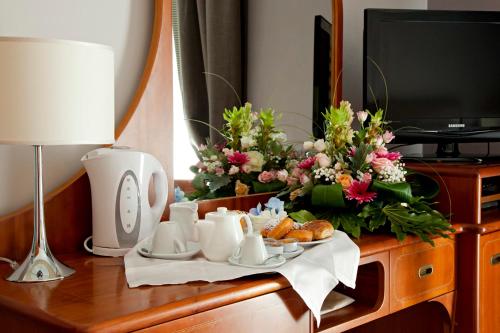 TV a/nebo společenská místnost v ubytování Hotel Villa Luisa