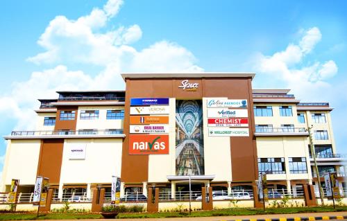 a building with a mural on the side of it at Verona Hotel and Conference Center in Ruiru