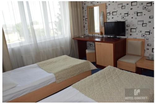 Posteľ alebo postele v izbe v ubytovaní Hotel Concrete
