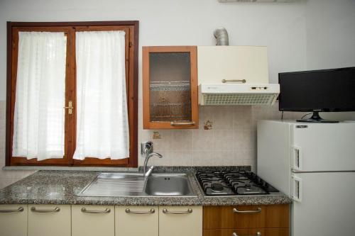 Η κουζίνα ή μικρή κουζίνα στο Residence le Mimose