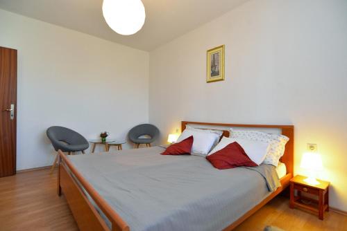 Posteľ alebo postele v izbe v ubytovaní Apartment Pineta 1817