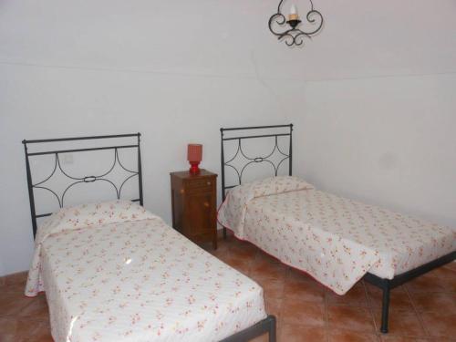 Ένα ή περισσότερα κρεβάτια σε δωμάτιο στο Agriturismo Osteria du Barba Pe' - Casa Miranda