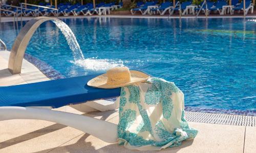 Bazén v ubytování Hotel Palia Las Palomas nebo v jeho okolí