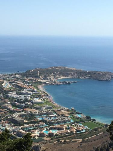 an aerial view of a small town next to the ocean at Costa Costa Villa - Luxury villa in Kolimbia