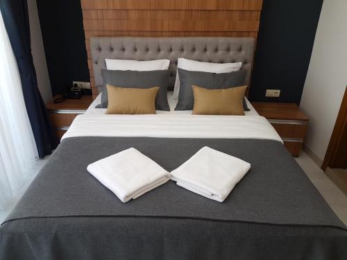 Ένα ή περισσότερα κρεβάτια σε δωμάτιο στο Vera Suite Hotel Trabzon
