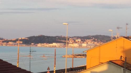 a view of a large body of water with buildings at Carpe Diem Ancona in Ancona