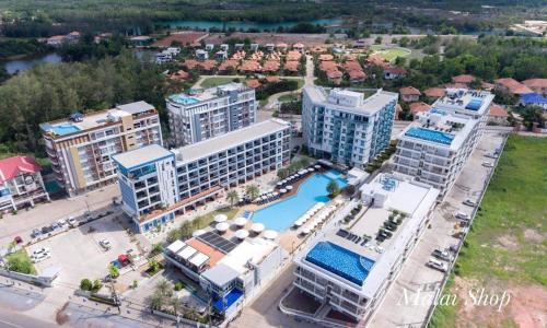 an aerial view of a resort with a pool at Grandbeach2 B52 By malai in Mae Pim