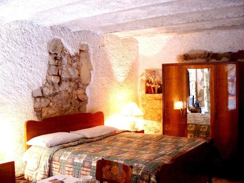 Un ou plusieurs lits dans un hébergement de l'établissement Medieval Village B&B