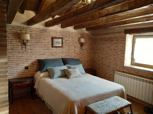 Ένα ή περισσότερα κρεβάτια σε δωμάτιο στο La casa de los abuelos lugar para disfrutar