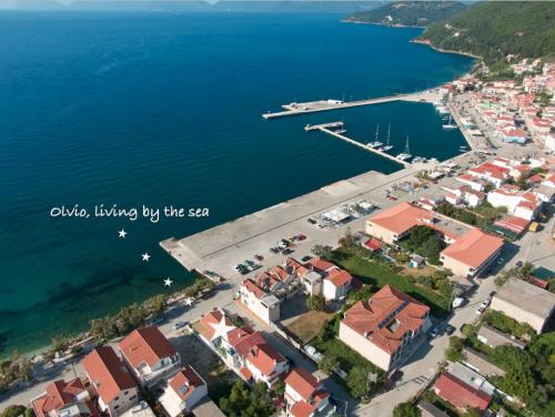 an aerial view of a small town by the water at Olvio Living by the Sea in Sami