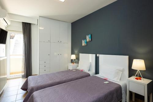 Posteľ alebo postele v izbe v ubytovaní White Coral