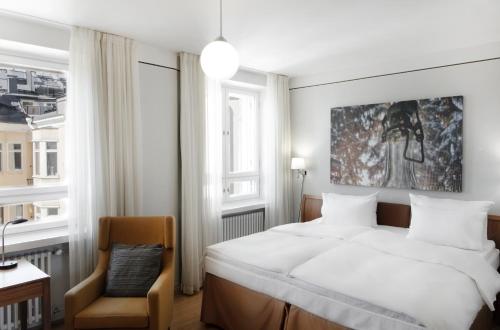 Ένα ή περισσότερα κρεβάτια σε δωμάτιο στο Radisson Blu Aleksanteri Hotel, Helsinki