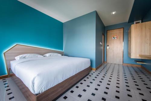 Postel nebo postele na pokoji v ubytování The Feeling Hotel