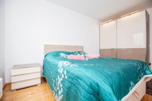 Ένα ή περισσότερα κρεβάτια σε δωμάτιο στο Ljubljana finest apartment