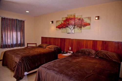 Katil atau katil-katil dalam bilik di Los Andes Coatzacoalcos