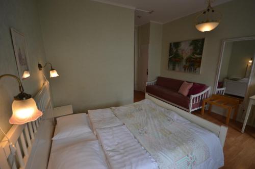 Ένα ή περισσότερα κρεβάτια σε δωμάτιο στο Hotell Royal