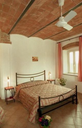 Letto o letti in una camera di Agriturismo San francesco