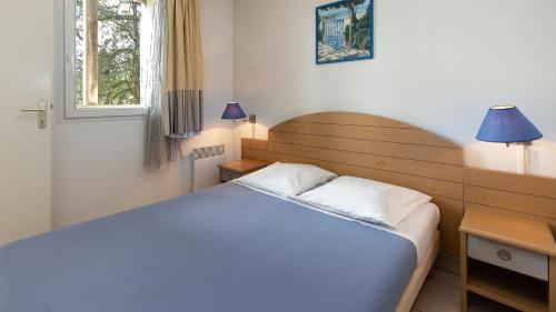 Voodi või voodid majutusasutuse Vacancéole - L'Allée des Dunes - Ondres Plage toas