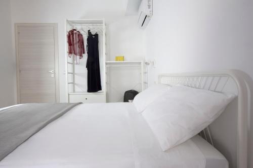 Cama o camas de una habitación en Funduq ospitalità iblea
