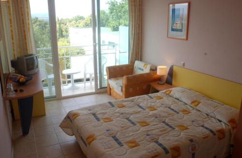 Ліжко або ліжка в номері Hotel Com - All Inclusive