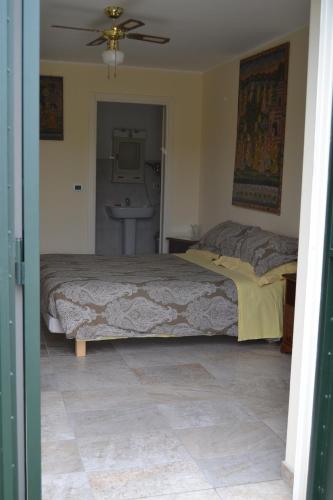 Ένα ή περισσότερα κρεβάτια σε δωμάτιο στο Joie de Vivre