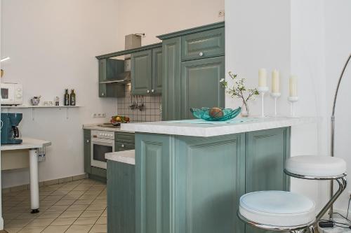 Kuchyň nebo kuchyňský kout v ubytování Hotel Germania