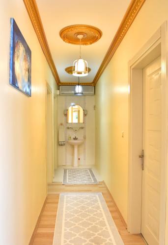 a hallway with a toilet and a ceiling at seasidehouse in Ordu