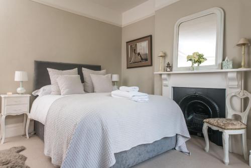 A bed or beds in a room at The Firs 