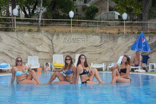 a group of women sitting in a swimming pool at Ahilea Hotel - Free Pool Access in Balchik